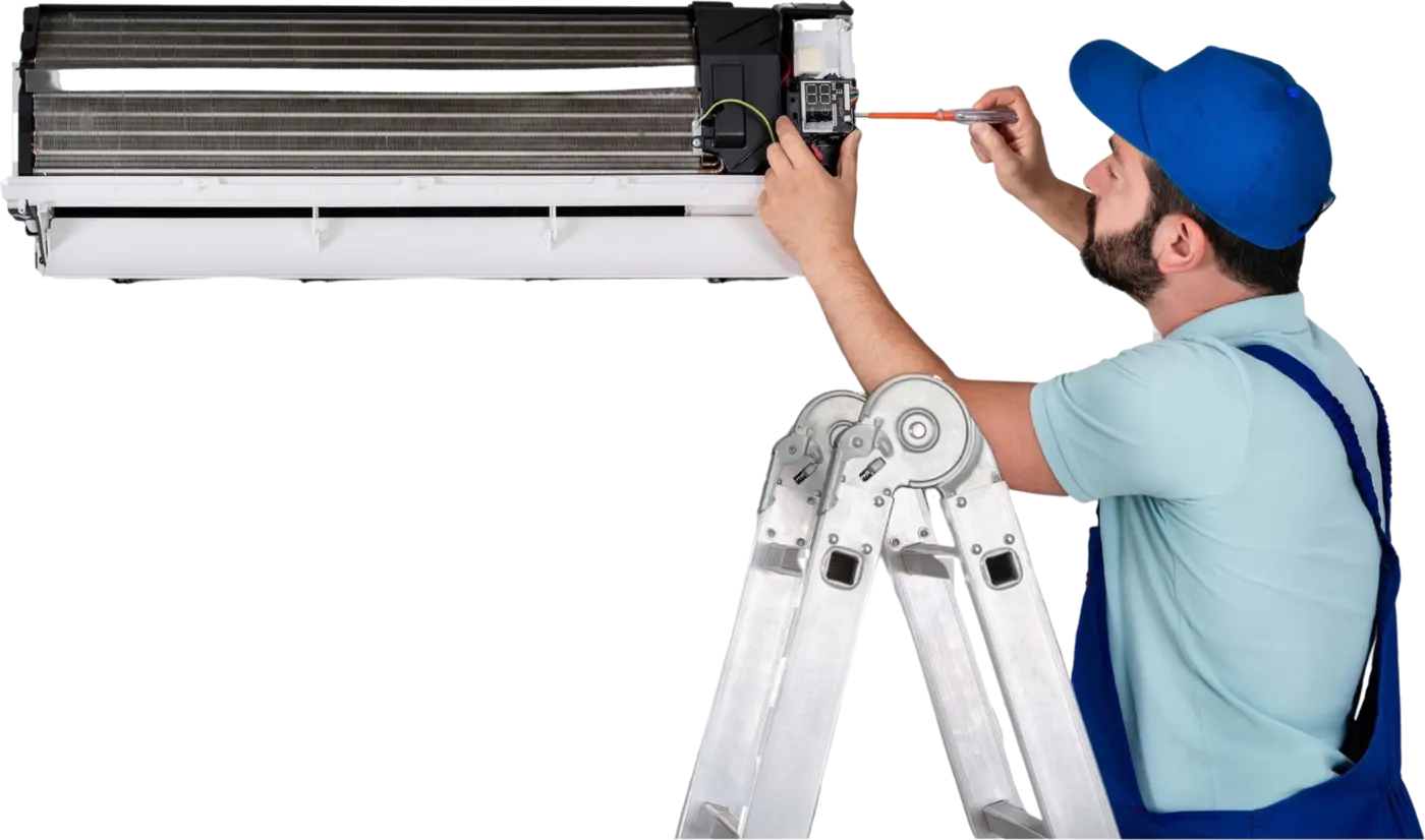 Technician inspecting an opened air-conditioning indoor unit